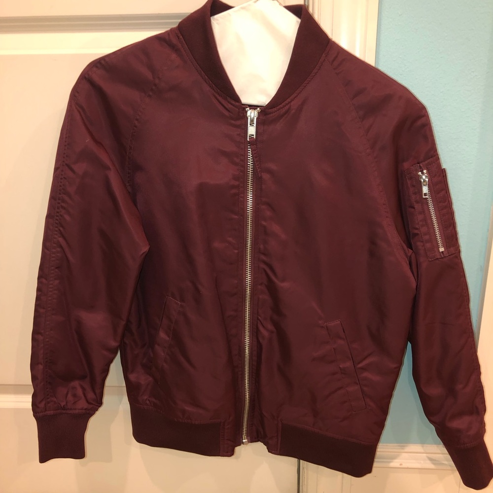 Maroon colored bomber jacket